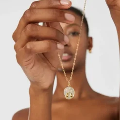 Colgante Libra con baño de oro 18 kt sobre plata, nácar y topacios Horoscope^TOUS Best